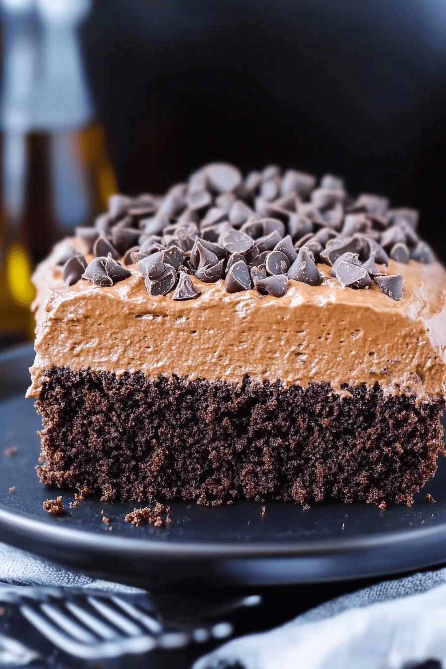 Kahlua chocolate cake slice on plate showing perfect texture and swirl pattern