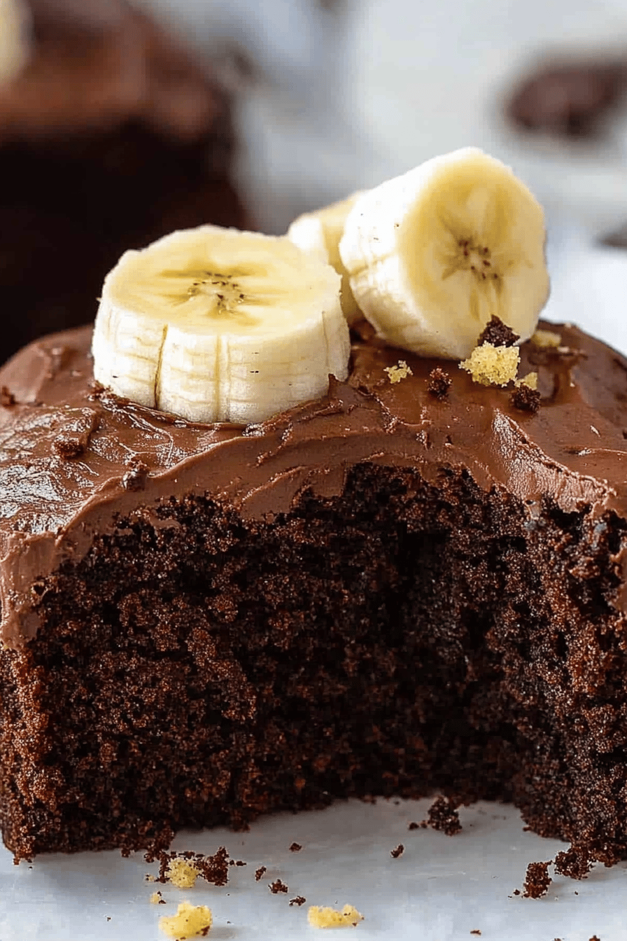 chocolate banana cake slice on plate showing perfect texture and swirl pattern