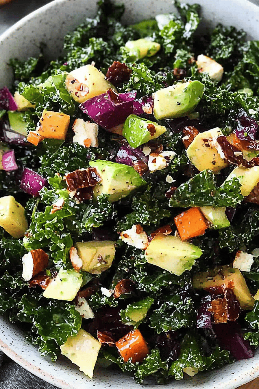 kale salad slice on plate showing perfect texture and swirl pattern