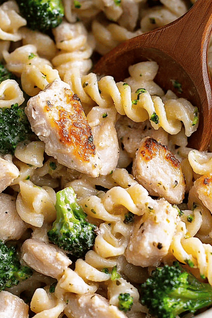 Chicken broccoli pasta ingredients organized and measured on kitchen counter