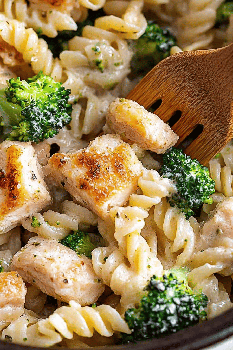 Chicken broccoli pasta slice on plate showing perfect texture and swirl pattern