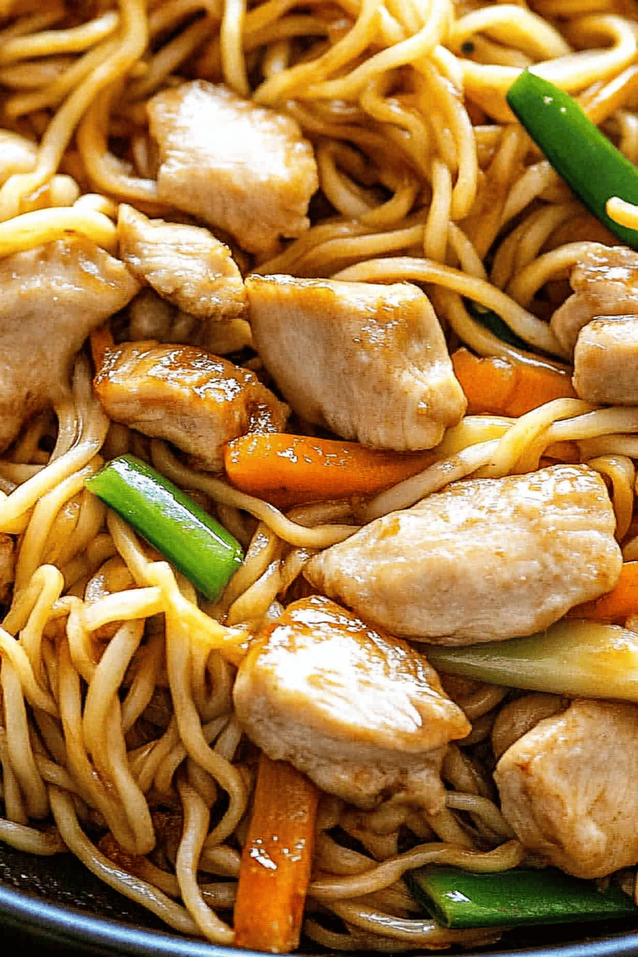 chicken chow mein slice on plate showing perfect texture and swirl pattern